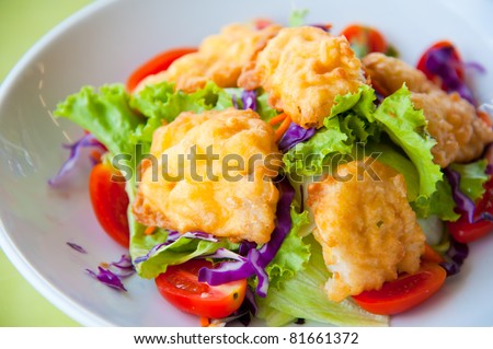 Delicious salad with fish, vegetable and dipping sauce