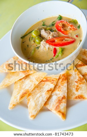 kind of Indian food made of flour with chicken green curry : Traditional Indian food