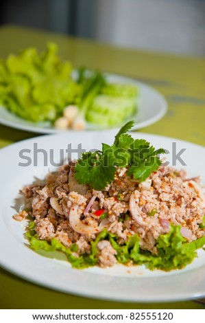 Larb chicken salad. Traditional Thai food, with ground chicken lime, chili and herbs. This food is popular in the north-east of the country (Isaan)