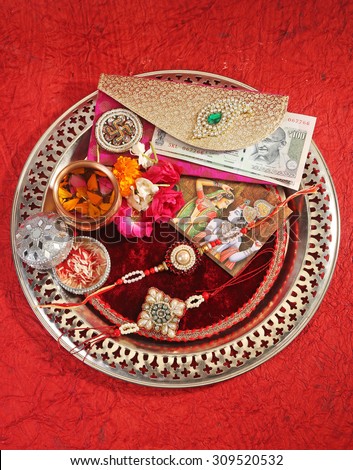 A rakhi is traditionally tied by a sister to her brother on the Raksha-Bandhan festival day in India.