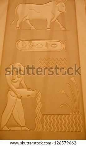 A wall bas relief of Egyptian decorations