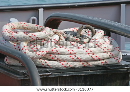 Nautical rope tied to some gear on a boat