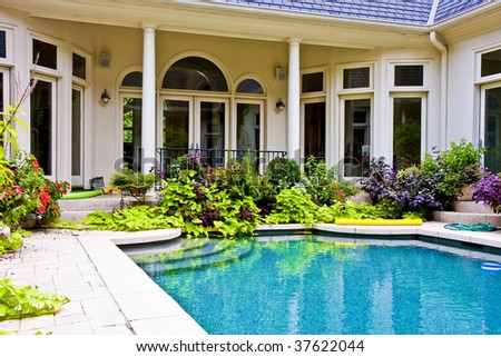 A nice residential pool in an interior courtyard