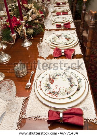 Festive china plates on a formally set holiday table