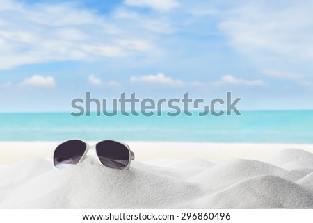Summer and Beach Concept. Sandy Beach with Sun Glasses