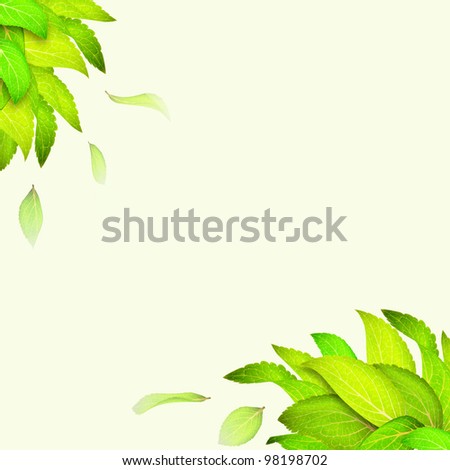 Falling green leaves on light green background