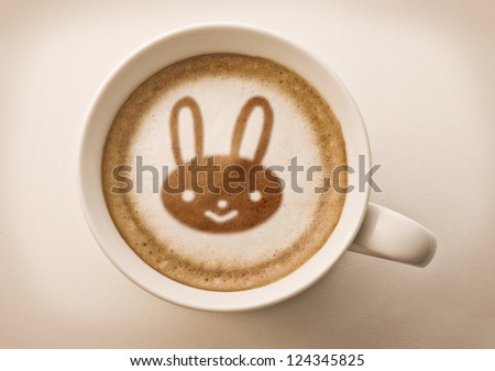 Easter rabbit drawing on latte art coffee cup