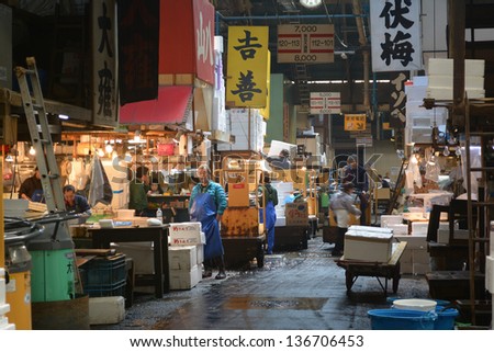 TOKYO - APRIL 5 : Fish seller at Tsukiji Market, the biggest wholesale market in Japan, market will be moved to new location in 2014, April 5, 2013 in Tokyo, Japan.