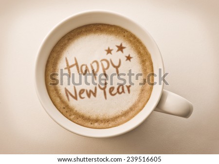 Happy New Year drawing on latte coffee cup