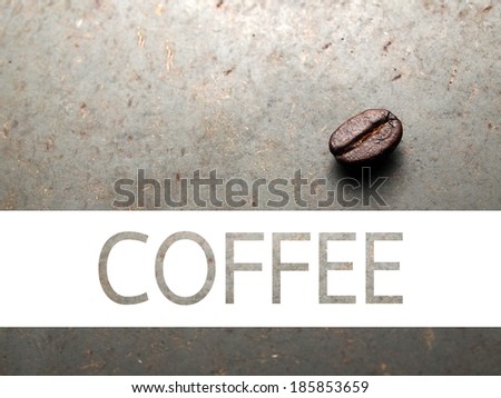 Roasted Coffee beans on texture concrete board, with coffee banner