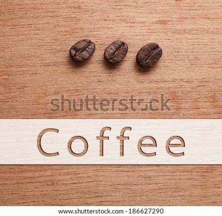 Coffee banner with Roasted Coffee beans on wood texture background