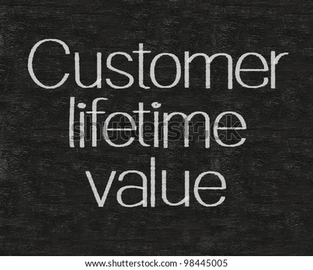 customer lifetime value written on blackboard background high resolution