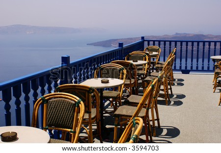 Coffee time on terrace in Santorini island, Greece