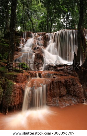 Paradise waterfall in Tropical rain forest of Thailand , water fall in deep forest at Tak province Thailand . The waterfall named Par Wai waterfall