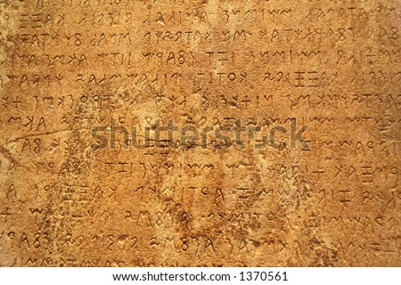 Ancient text carved on a stone slate. Makes a great background!