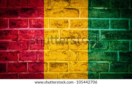 Collection of european flag on old brick wall texture background, guinea