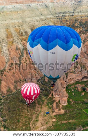 GOREME, TURKEY - APR 15, 2015: The great  balloon flight Cappadocia is known around the world as one of the best places to fly with hot air balloons on April 15,2015 Goreme, Cappadocia, Turkey