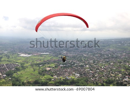 parashoot above batu city at indonesia