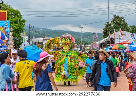 LOEI ,THAILAND-JUNE 27: Ghost Festival (Phi Ta Khon) is a type of masked procession celebrated on Buddhist merit- making holiday known in Thai as\