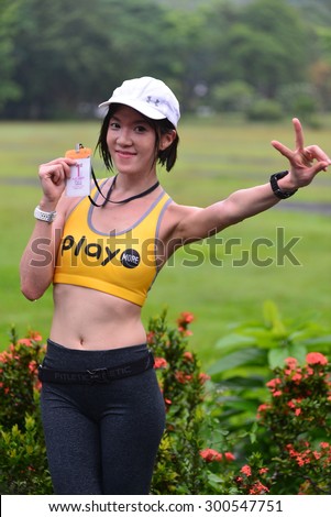 NAKORNNAYOK, THAILAND - JULY 26: First Runner-up Unidentified girl runner on REFILL MARATHON ACTIVE RUN 2015 at Nakornnayok on July26, 2015 in Nakornnayok,Thailand.