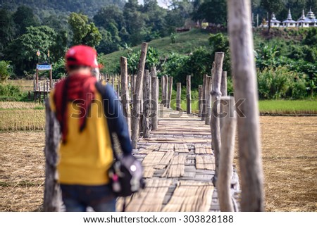 Maehongsorn Province, Thailand-December 1,2013:Su Tong Pae Bridge.The Bamboo Bridge of Faith Across the Rice Fields of Mae Hong Son, Thailand