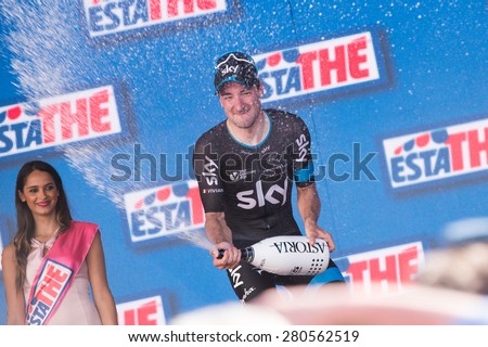 Genova, Italy - May 10 2015: Elia Viviani (TEAM SKY) celebrates on the podium of the second stage Albenga - Genova of Giro D\'italia