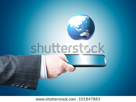 Businessman holding tablet PC screen with blue internet globe and email coming out from the screen. Concept for internet and connectivity