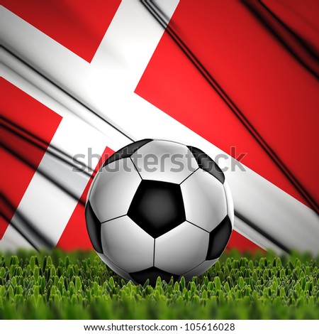 Soccer ball on grass against National Flag. Country Denmark