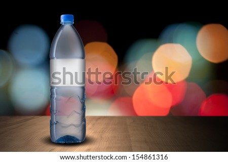 Bottle of water on wood table