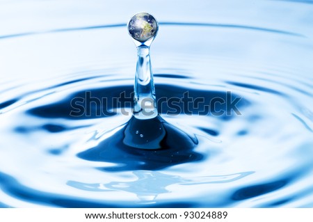 Round water drop of water with earth inside. Concept for environmental awareness. Go Green. Save the earth. Source: NASA