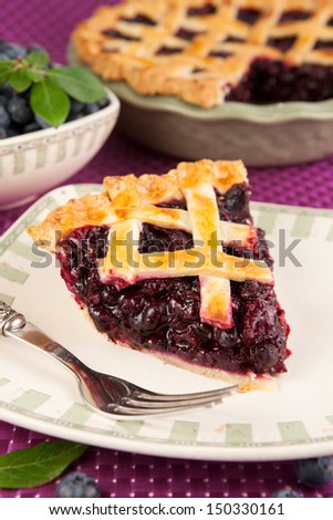 Similar – Image, Stock Photo Sliced blueberry pie. Lattice crust cake top view