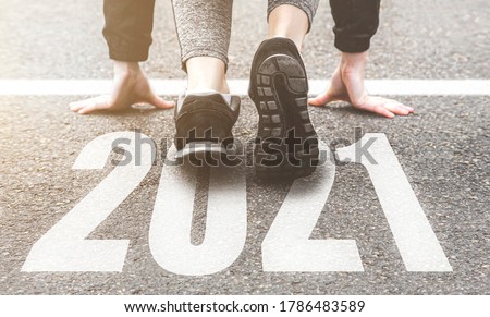 Photo of Sneakers close-up, finish 2020. Start to new year 2021 plans, goals, objectives
