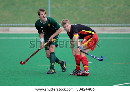BLOEMFONTEIN, SOUTH AFRICA - MARCH 14: Players in action during an international men\'s field hockey game between Germany and South Africa March 14, 2009 in Bloemfontein. Germany won 4-3.
