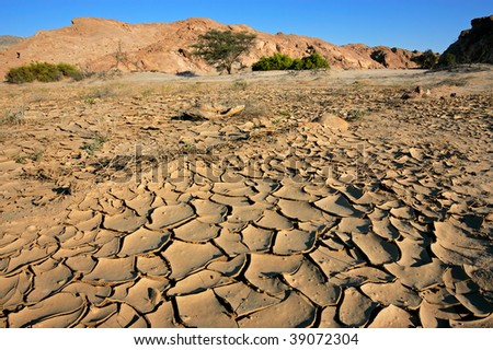 Cracked mud in a dry riverbed, Namib-Naukluft National park, Namibia, southern Africa