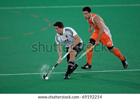 BLOEMFONTEIN, SOUTH AFRICA - JANUARY 16: Unidentified players during a men's field hockey game between Germany and Netherlands (Netherlands won 2-1) on January 16, 2010 in Bloemfontein, South Africa.