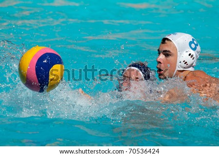 BLOEMFONTEIN, SOUTH AFRICA - JANUARY 28: Unidentified water polo players in action during the annual Grey College water polo tournament on January 28, 2011 in Bloemfontein, South Africa