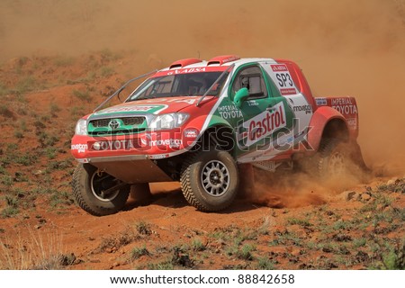 BLOEMFONTEIN, SOUTH AFRICA - OCTOBER 15: Duncan Vos and Rob Howie in their Toyota Hilux in action during a South African off road championship event, Bloemfontein, South Africa, 15 October 2011