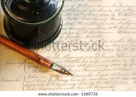 Old-fashioned wooden nib pen with inkwell, and background of 19th Century handwriting