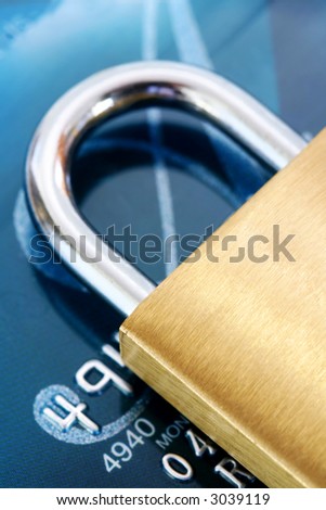 Security:  Brass padlock on credit card.