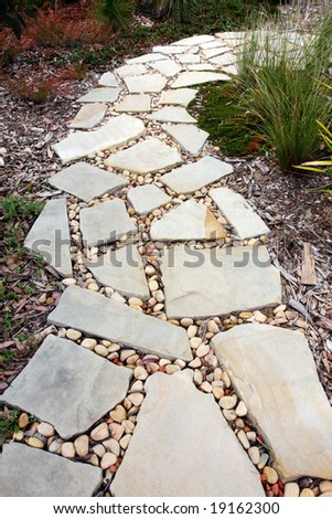 Cobblestone And Pebble Pathway Winding Through A Garden. Stock Photo ...