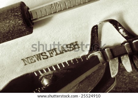 Vintage typewriter with aged paper, showing the word \