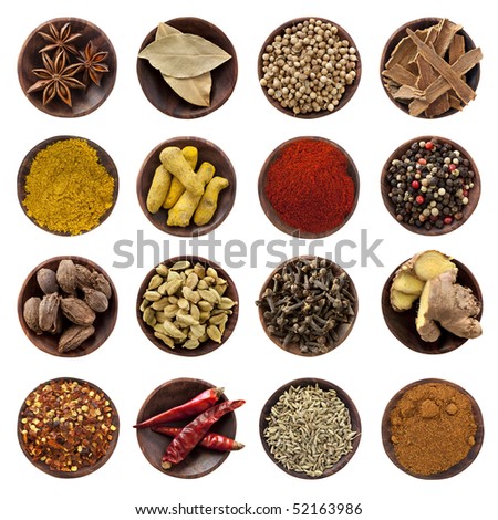 Collection of spices. Star anise, bay leaves, coriander seeds, cinnamon bark, curry powder, turmeric fingers, paprika, peppercorns, black cardamom pods, cardamom seeds, cloves, ginger root, chili fla
