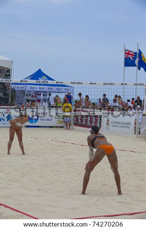 GRAND CAYMAN, CAYMAN ISLANDS - MARCH 27: Female volleball players at the NORCECA beach volleyball competition March 27, 2011 in Grand Cayman, Cayman Islands