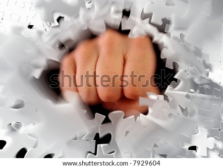 Breaking puzzle by knocking it to pieces. Photo-based graphic compositing.