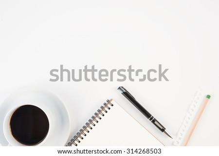 Cup of hot coffee  and diary notebook on white background for text and background.Copy space