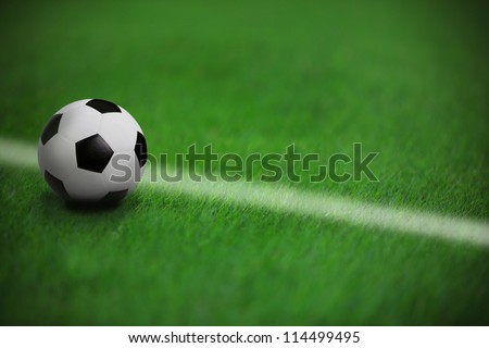 soccer football on green grass in stadium  with white line