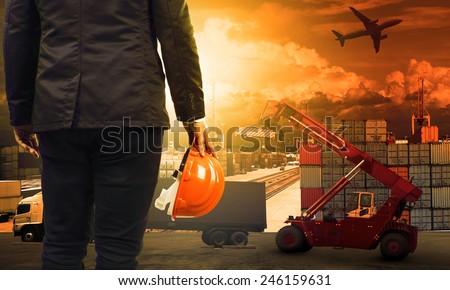 working man in container dock and air ,land transport ,import export logistic cargo freight and shipping commercial service industry