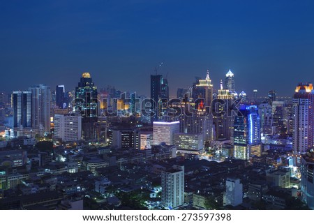 city scape in heart of bangkok thailand with beautiful lighting of office building and sky scrapper against dusky sky twilight time