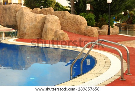 a steps in blue water pool sports