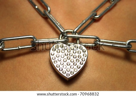 chain with a lock on the neck